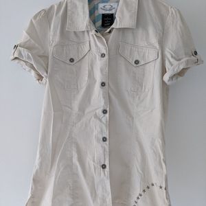 Cream colored snap front shirt